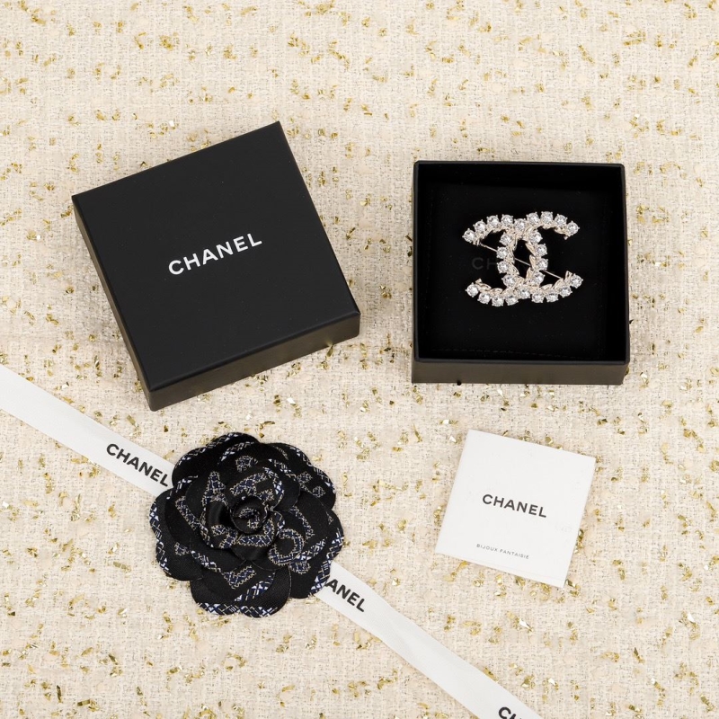 Ch*el brooches